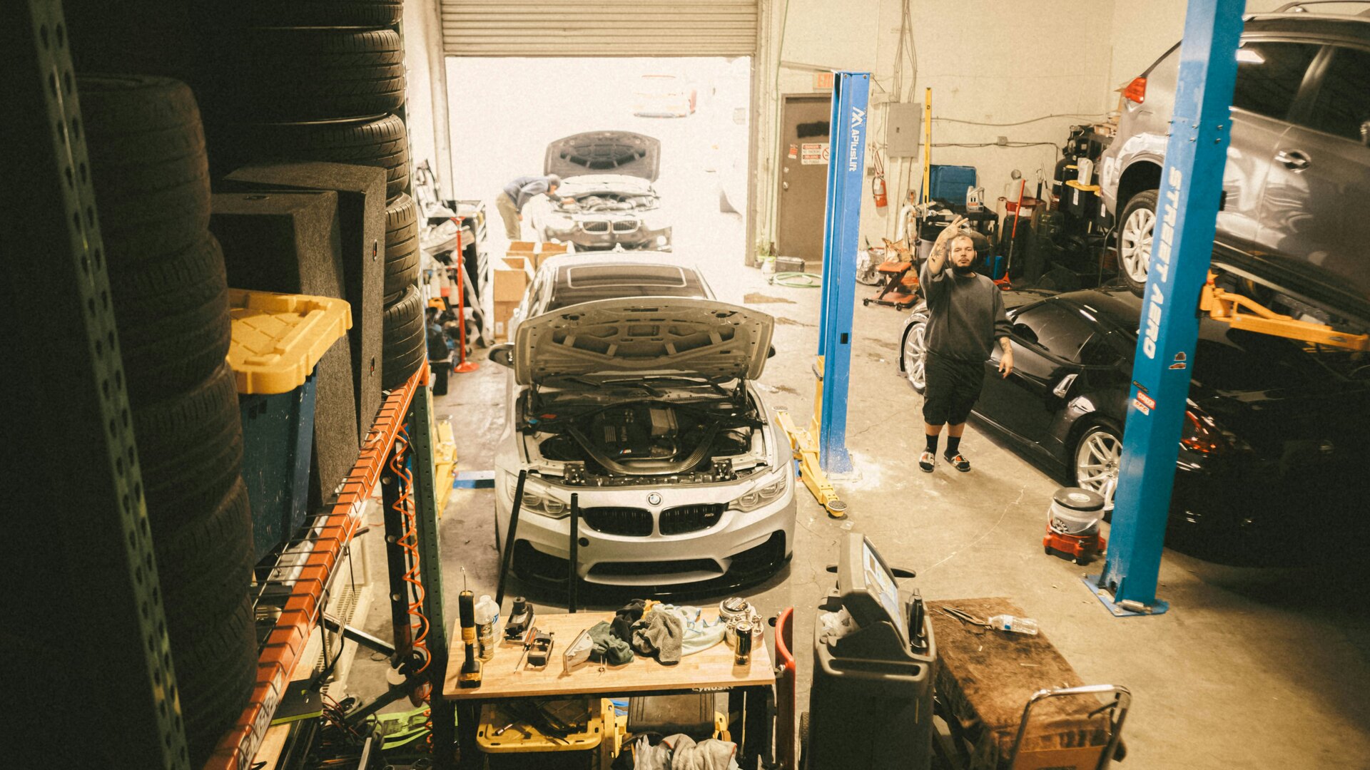 Auto service team coordinating workshop jobs